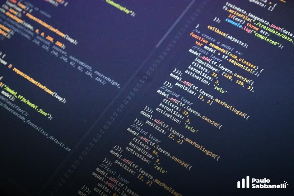 Tela escura com código JavaScript usando TensorFlow.js para criar camadas de rede neural